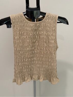 Sleeveless Smocked Ruffle Hem Top - Beige
